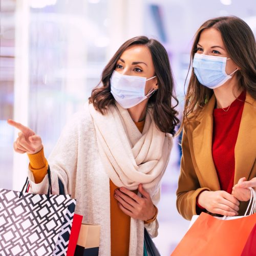 Two,Young,Girl,Friends,In,Safety,Medical,Masks,During,Shopping
