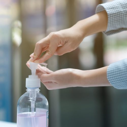 A,Girl,Using,Alcohol,Gel,For,Cleaning,Hands